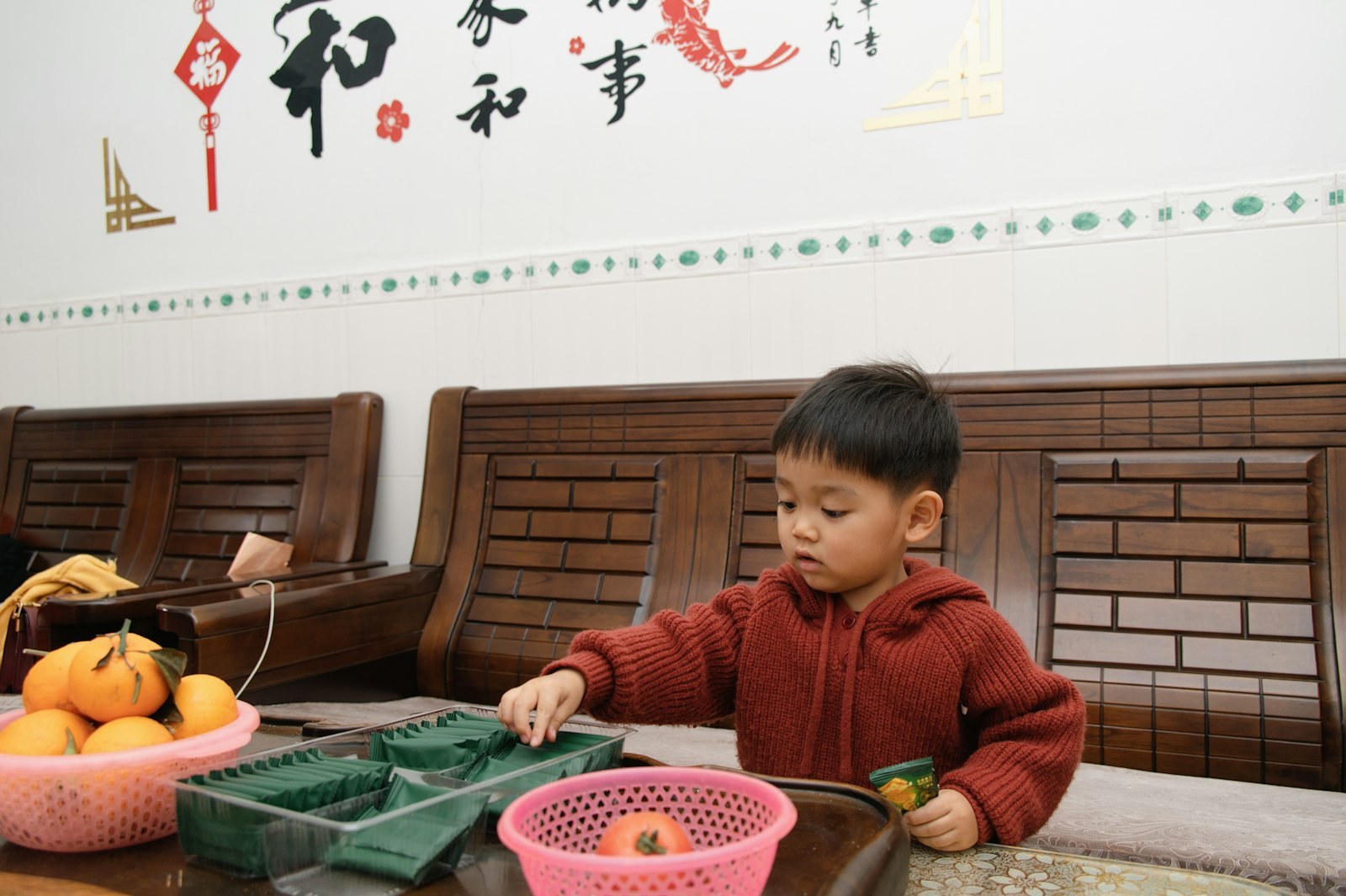 Toddler playing with toys at home, rainy day activity